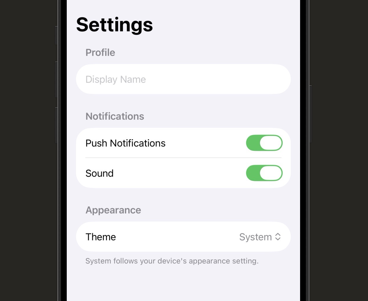 Simulator screenshot of a settings-style Form view with a 'Settings' navigation title. Three grouped sections are visible: 'Profile' containing a TextField row, 'Notifications' containing two Toggle rows (second Toggle greyed out because first is off), and 'Appearance' with a Picker row showing 'System' selected and a small grey footer note below.