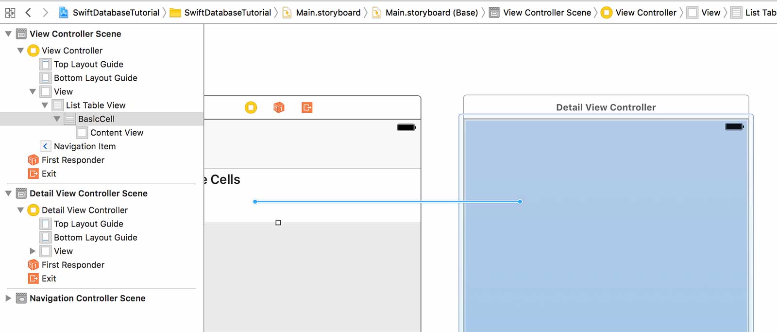 Hold CTRL and click the table cell and drag to a second view controller in storyboard